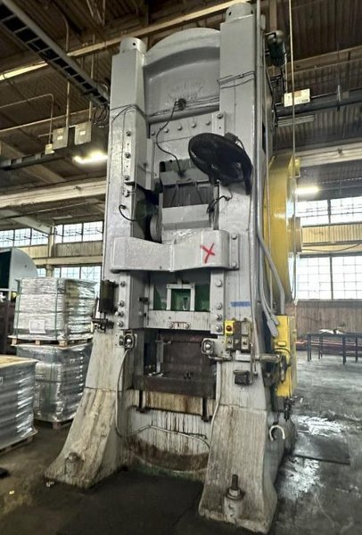 1200 TON CLEVELAND MODEL #12K KNUCKLE JOINT PRESS, 10" STROKE. STOCK # 0540926