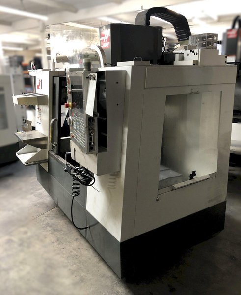 Haas VF-1 Vertical Machining Center 2012 With Ridid Tap, Remote Hand Jog, Expanded Memory, P-Cool, Hil, 4th Axis Ready, 8100 RPM Spindle, Chip Auger,