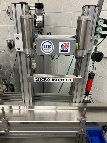 DK Technologies Micro Bottler MB04 Filling and Capping Machine, 2018 – Includes 4 HP California Air Tools 60040CAD 60-GAL Steel Tank Air Compressor w/ Auto Drain