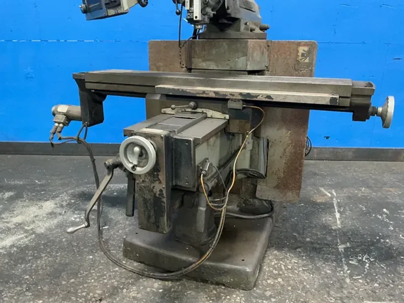 BRIDGEPORT 11” X 58” VERTICAL MILL