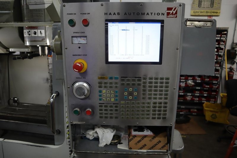 Haas VF-2SS CNC Vertical Machining Center, 12K Spindle, 4th Axis Brushless Drive with SHRT-160H Rotary Table, 24 Station SMTC, Probing, Chip Auger - Auction Item