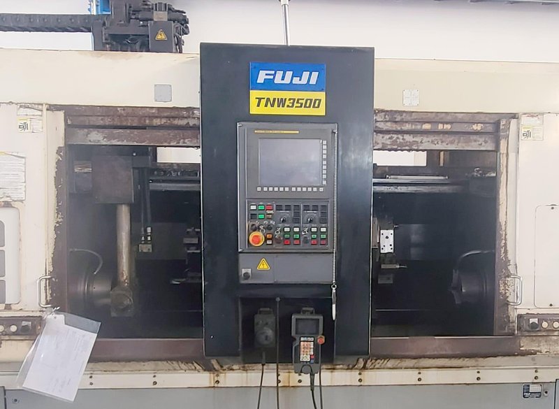 FUJI TNW-35TR 6-AXIS TWIN SPINDLE LIVE TOOL LATHE W/ GANTRY LOADER, 2007- Twin Turrets, 8″ Chucks x2