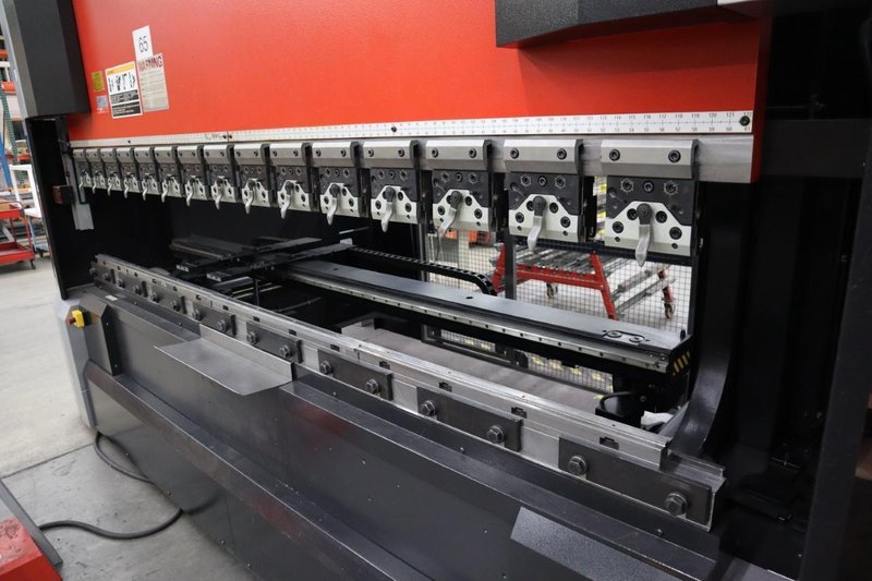 Amada HG 1303 CNC Hydraulic Press Brake, 143 Ton x 112.4", Down-Acting, AMNC 3i Control, 6-Axis BG, Curtains