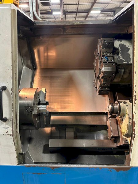 Doosan Daewoo Puma 300C CNC Lathe, 2005 – 15″ Chuck, Chip Conveyor, Programmable Tailstock