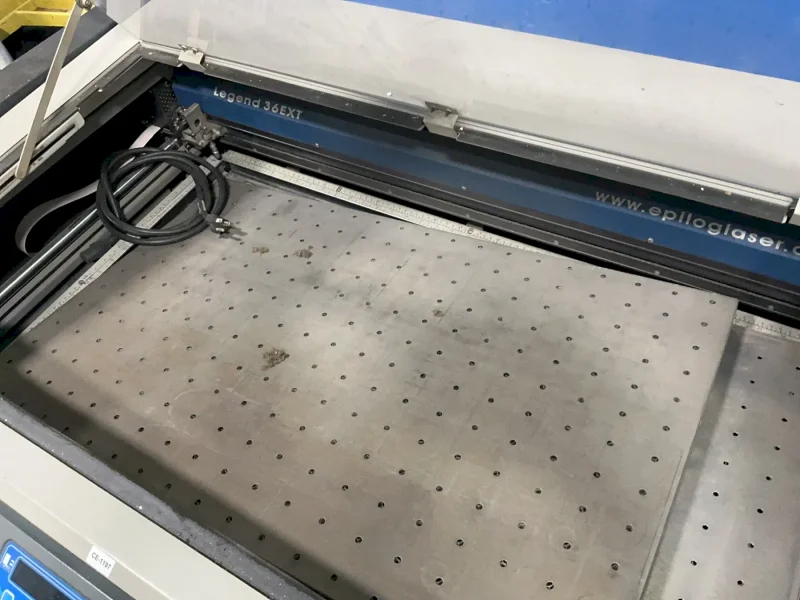EPILOG CORP. LASER ENGRAVING AND CUTTING MACHINE   -  9000 LASER SYSTEM