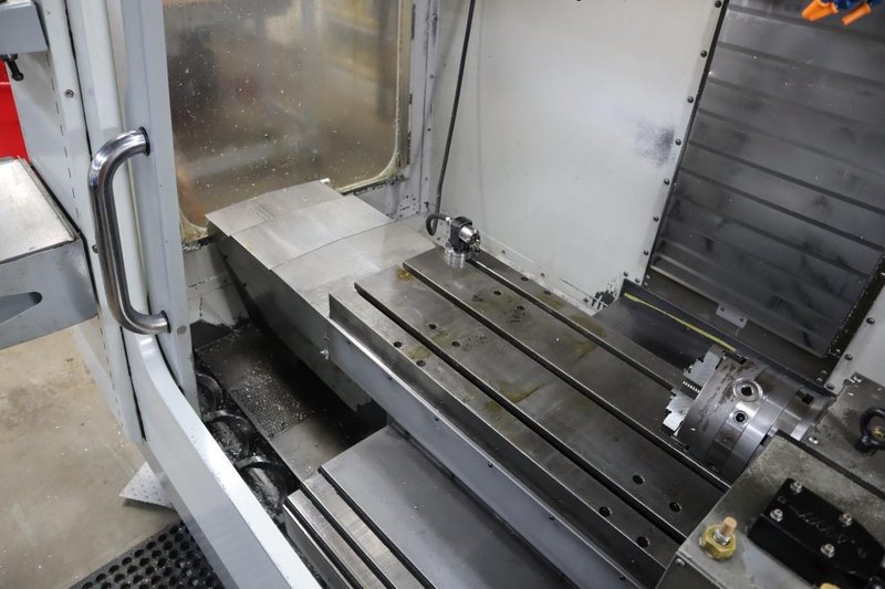 Haas VF-2SS CNC Vertical Machining Center, 12K Spindle, 4th Axis Brushless Drive with SHRT-160H Rotary Table, 24 Station SMTC, Probing, Chip Auger - Auction Item