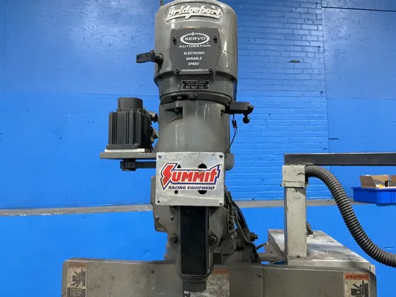 BRIDGEPORT 9”X42” TABLE CNC VERTICAL MILL