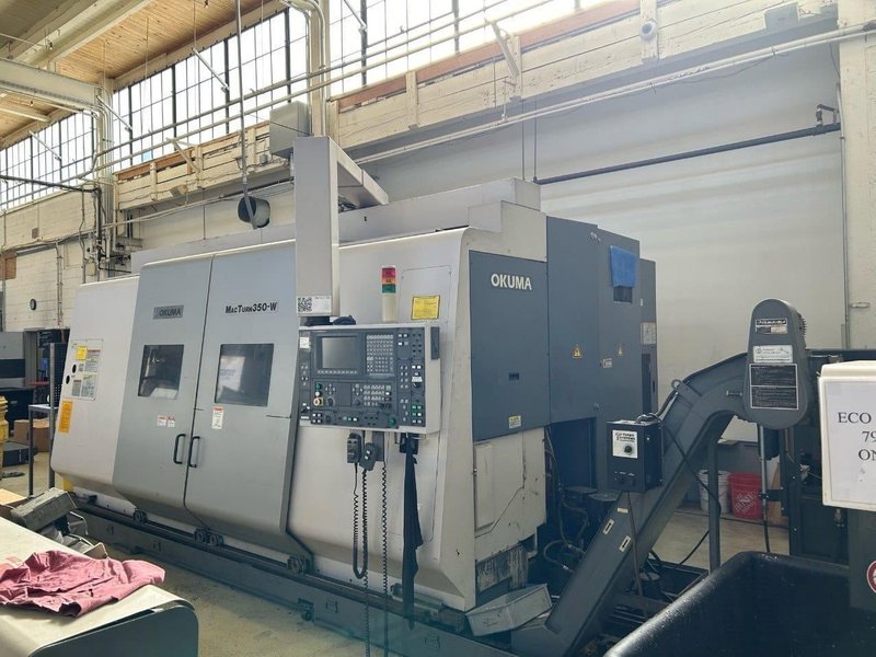Okuma Macturn 350-W Multi-Axis CNC Lathe, 2004 – Chip Conveyor