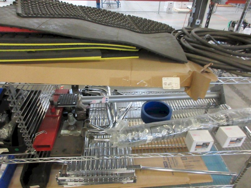 Uline Rolling Metal Wire Cart with Contents Including, Shelving Accessories, Anti-Fatigue Mats, Wall Storage Supplies and MORE!- Auction Item