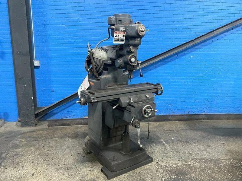 FAMCO 10” X 40” VERTICAL MILL  -  100