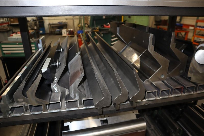 Amada Press Brake Dies, Ram Clamps and Lower Die Holders on Steel Rack- Auction Item