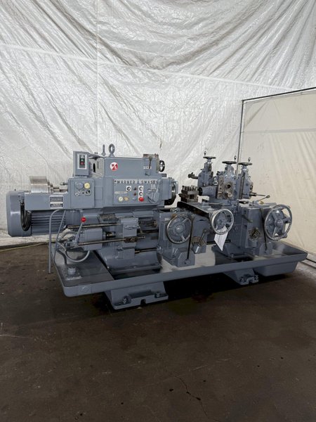 1A WARNER &amp; SWASEY M–3400 SADDLE-TYPE TURRET LATHE W/ TOOLING. STOCK # 0550225