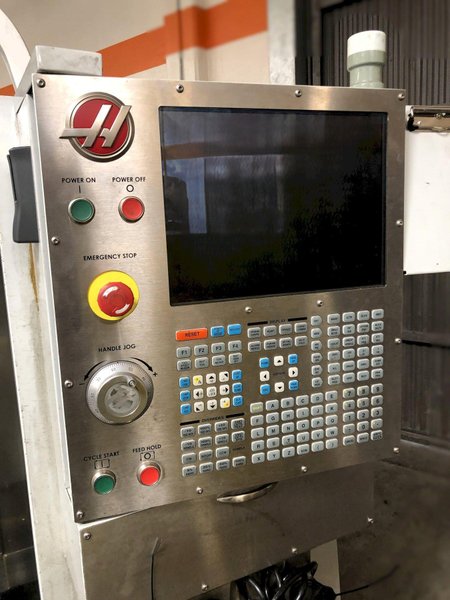 Haas VF-1 Vertical Machining Center 2012 With Ridid Tap, Remote Hand Jog, Expanded Memory, P-Cool, Hil, 4th Axis Ready, 8100 RPM Spindle, Chip Auger,
