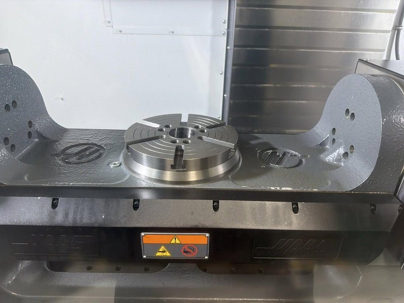 Haas VF-3 VMC, 2021 – TR-210 5th Axis, 50 ATC, WIPS, HSM, 15K RPM, Chip Auger