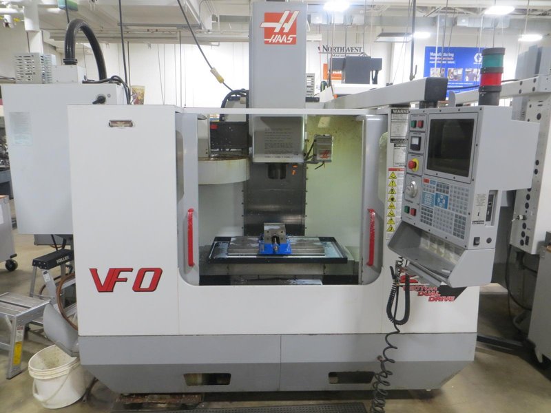 Haas VF-0 CNC Vertical Machining Center, Haas 32-Bit CNC Control, 4th Axis Drive, 20-Station Tool Changer, Programmable Coolant, Remote Jog Handle, Chip Auger - Auction Item