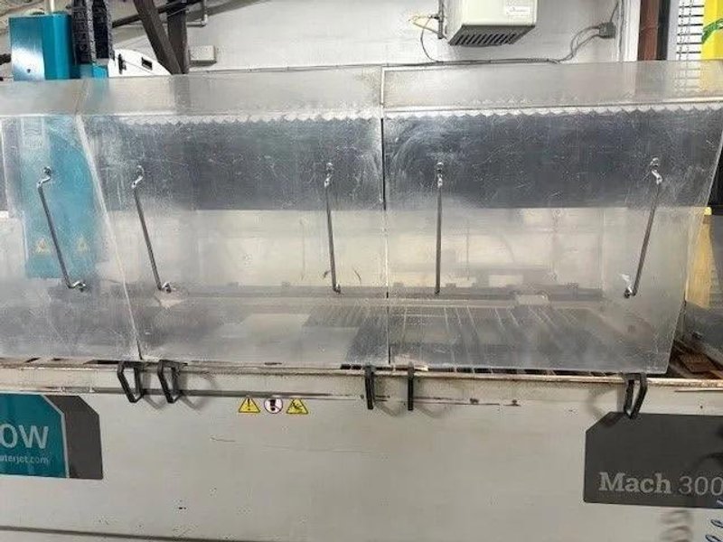 6.5′ x 10′ Flow Mach 3 3015 Waterjet, 2018 – 94,000 PSI, Low Hours, Well Maintained, Custom Guards, NEEDS TO MOVE