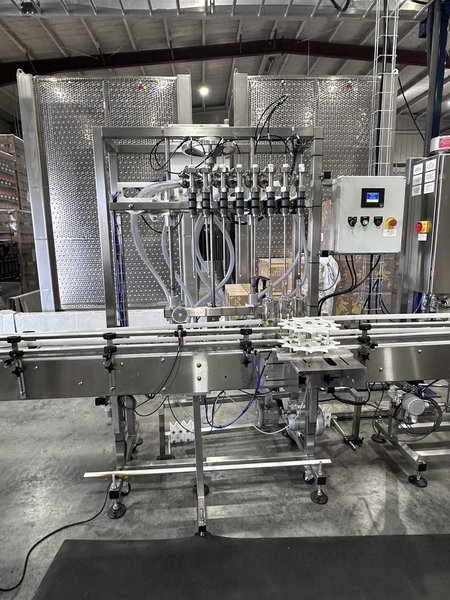 Inline Filling Systems Complete Used Bottling &amp; Labeling Line for Spirits (GNS 80 Proof Vodka) – Labeler, Filler, Capper, Conveyor, Heat Tunnel, Turntables &amp; More – C1D2 Hazardous Location Rated, 2024
