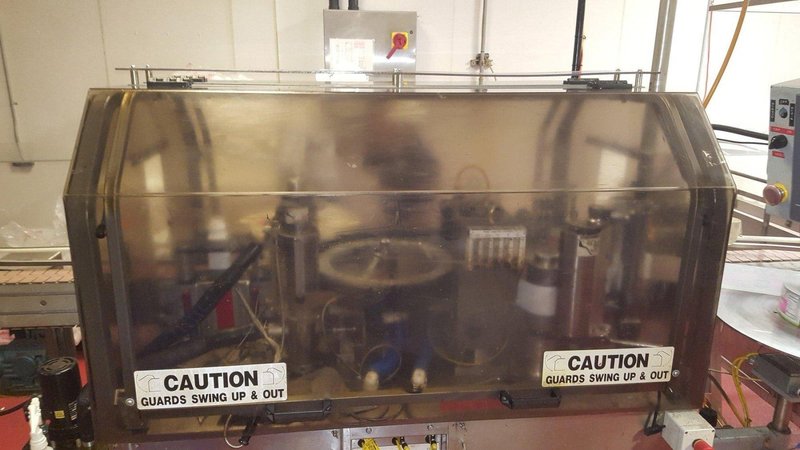 Trine Model 4500 Roll-Fed Wrap Around Hot Glue Labeler