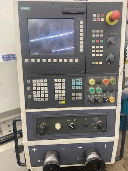 Romi C680 CNC Lathe, 2012 – Tailstock, Chip Conveyor