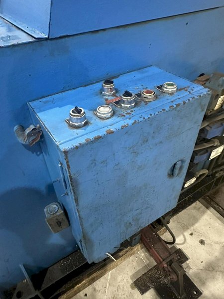 12,000 LB X 72" ROWE MODEL #12060-DSV POWERED COIL REEL / UNCOILER WITH HOLD DOWN ARM: STOCK 20234