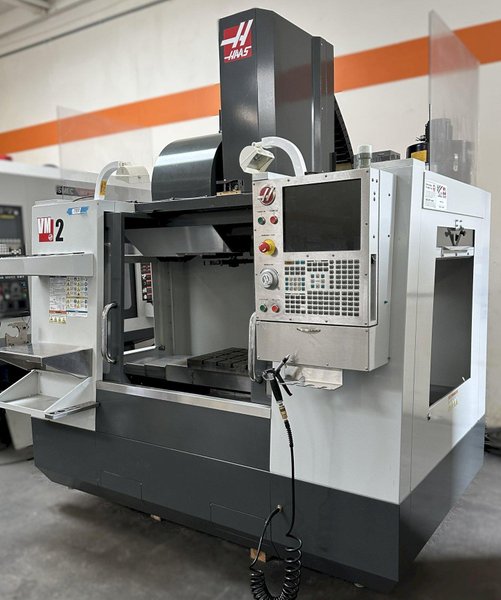 HAAS VM-2 CNC Vertical Machining Center 2010 equipped with Haas Control,  24 ATC Side Mount Tool Changer, Tool Pre-Setter, Cool, Chip Auger