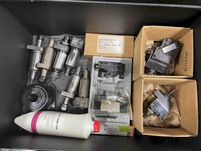 Traub TNL26 CNC Swiss Lathe, 2001- LNS Bar Feeder, Mist Collector, Conveyor, 34 Stations, Live Tools