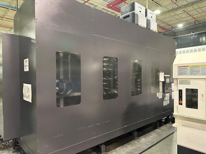OKUMA MB8000H CNC HMC, 2017, equipped with OSP P300M CNC Ctrl., 12 pallets, 12,000 RPM, and robust automation features including 12 pallet cell configuration, shower coolant and Renishaw tool breakage detection and Renishaw Part Probe, 50 HP, New 2017