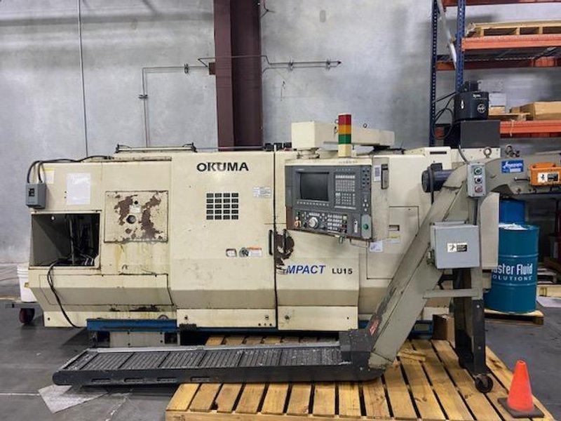 Okuma LU15 CNC Lathe, 2002 – Tailstock, Chip Conveyor
