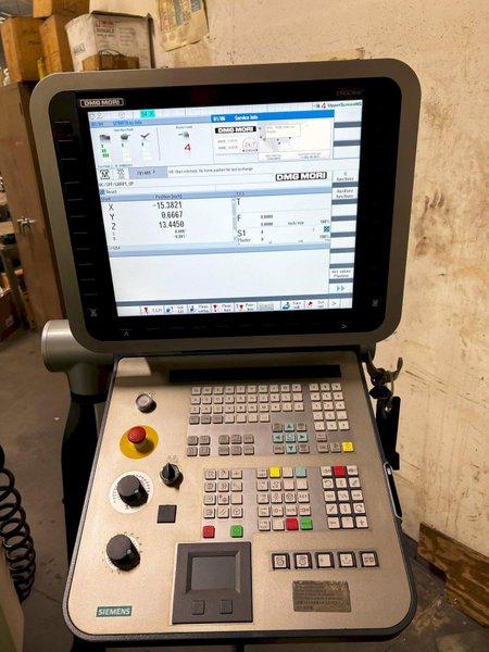 DMG DMU50 5-Axis 2015 Machining Center, Swivel Rotary, CAT40, 18,000 RPM, 60 ATC, Infrared Measuring Probe, Blum tool laser Measuring, Through Spindle Coolant, and Chip Conveyor.