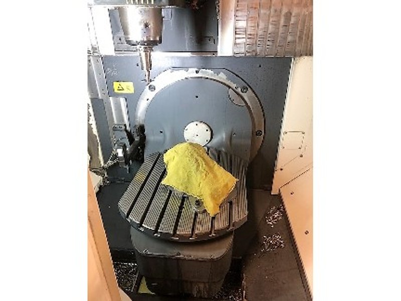 DMG Mori DMU 50 Universal CNC 5-Axis VMC 2014 with: Siemens 840D, CAT40,  60 ATC Tool Measuring, and Chip Conveyor.