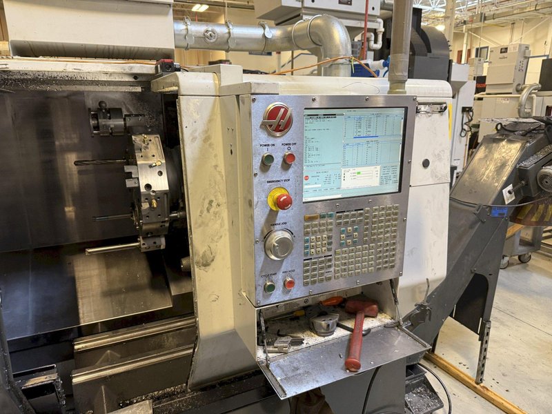 Used 2012 Haas ST-20 CNC Lathe with Bar Feeder For Sale
