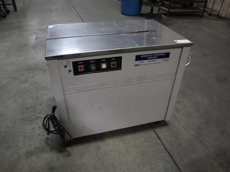ULINE H-959 Poly Strapping Machine, Semi-Automatic, Portable on Casters- Auction Item