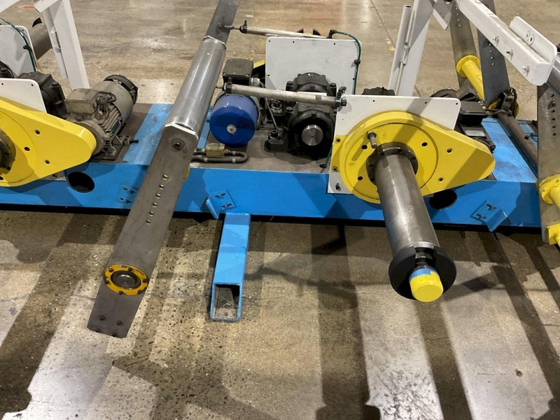 SETIC PAYOFF MOTORIZED WHEEL STAND  220″ 7 SPINDLES 20 1/2″ LONG 5″ DIA USED