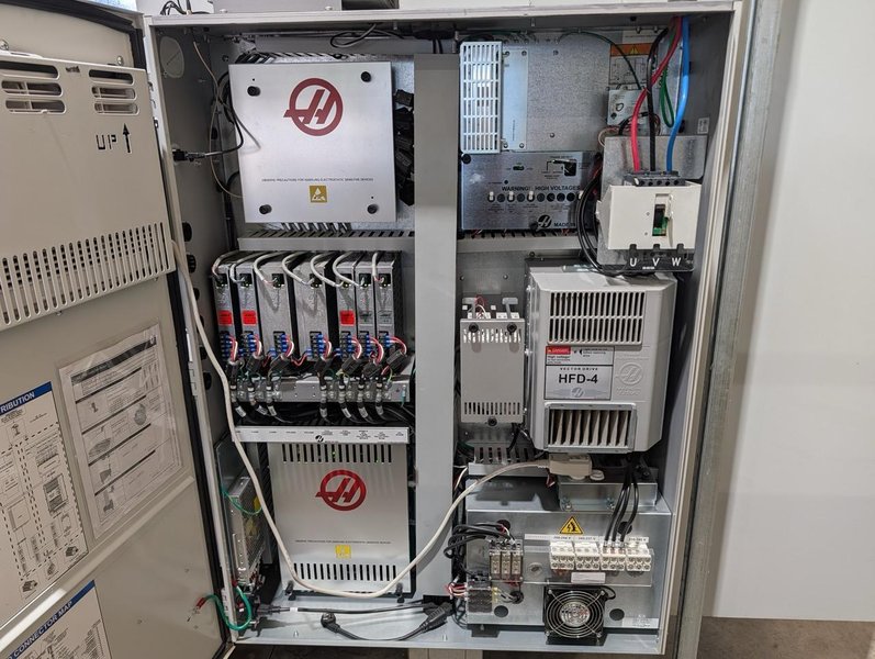 Haas UMC-750 5-Axis UMC, 2023 – 15,000 RPM Spindle, Chip Conveyor, Rigid Tapping
