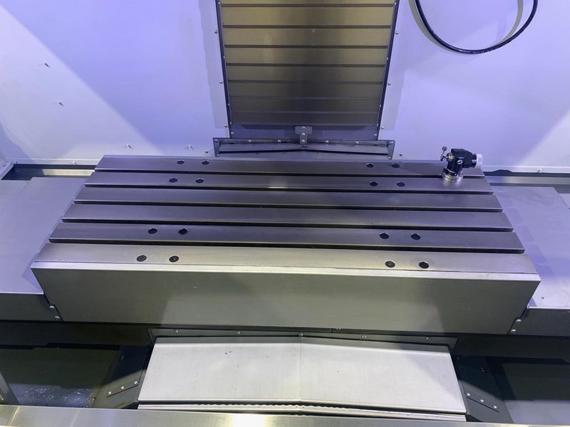 Haas VF-3 VMC, 2020 – Renishaw Probe, 4th Axis Wired, Chip Auger, Used For Testing Only – Never Ran Production
