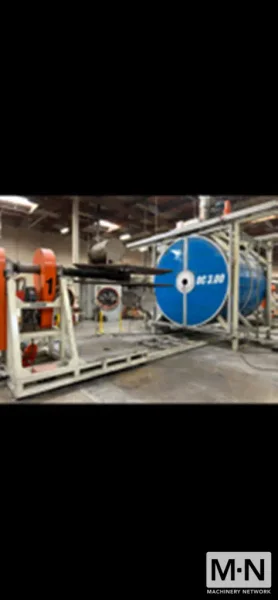 2 ARM ROTOLINE MODEL DC3.00XT ROTATIONAL MOLDING MACHINE MFG 2000