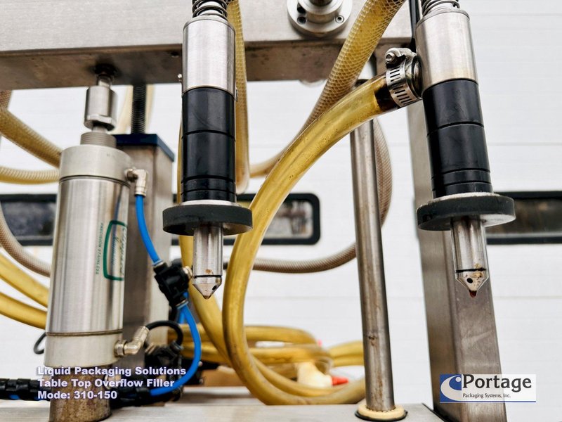 Liquid Packaging Solutions Model: 310-150  ||  Semi-Automatic Table Top Overflow Filler