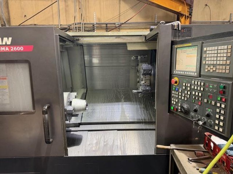 Doosan Puma 2600 CNC Lathe, 2011 – Tailstock, Chip Conveyor, Fanuc 0i Control