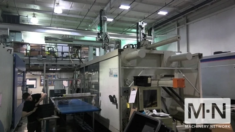 1000 TON 185 OZ UBE MODEL UM1000 INJECTION MOLDING MACHINE MFG 1999