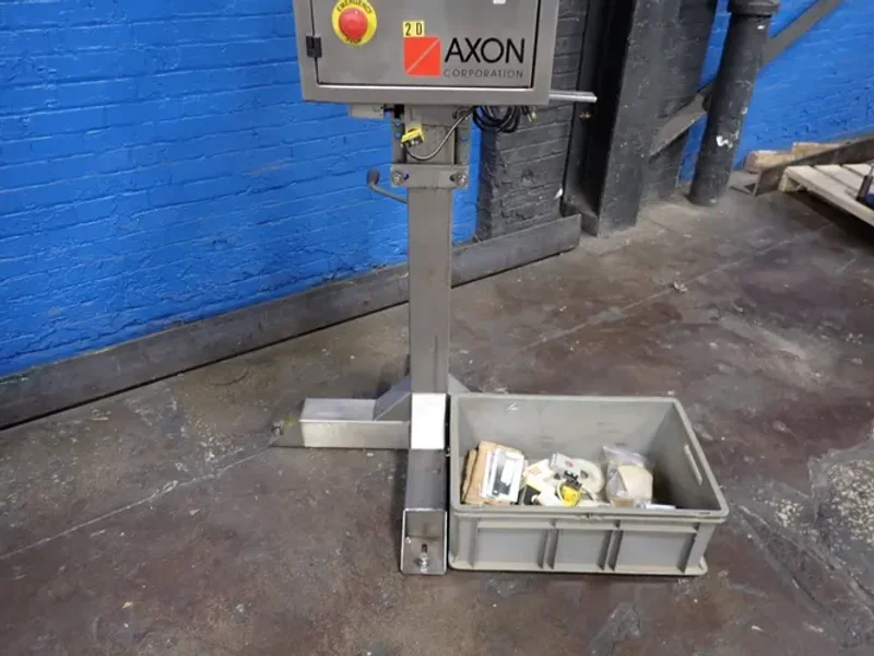 AXON CORPORATION SLEEVE LABEL APPLICATOR  -  EZ-100