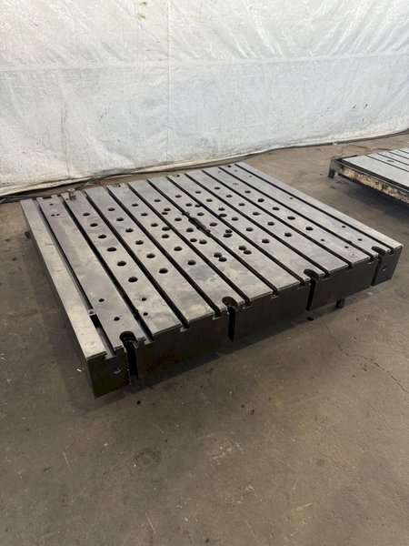 60&quot; WIDE X 67&quot; LONG X 9&quot; THICK T-SLOTTED BOLSTER PLATE. STOCK # 1006324