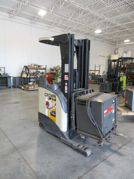 Crown Electric Standing Reach Forklift with Charger, 3500 LB Load Capacity- Auction Item