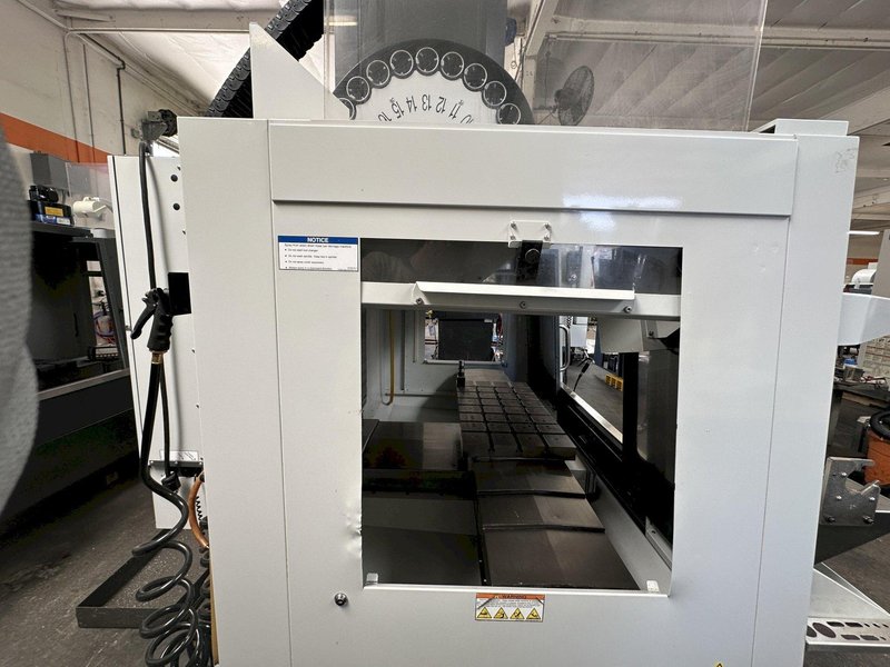 HAAS VM-2 CNC Vertical Machining Center 2011 equipped with quipped with 30"x20"x20" Travels, Haas Control, 4th Axis Drive, 24 ATC Side Mount Tool Changer, Tool Pre-Setter, Cool, Chip Auger