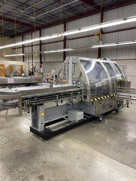 IWKA Fabrima Semi-Automatic Continuous-Motion Vertical Cartoner, Model VP-120, 2005 – Allen Bradley PanelView 600 Control – 8″ Centers, 2005