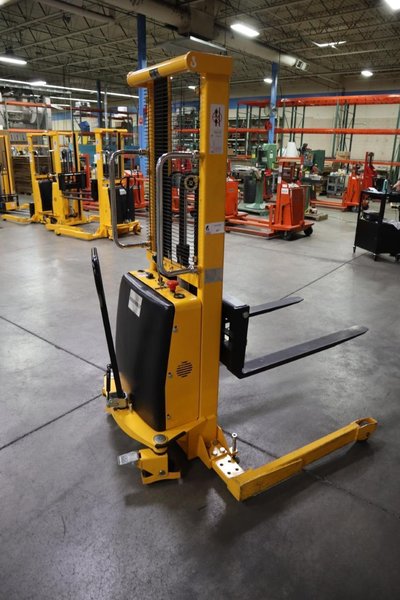 Uline H-5439 Electric Straddle Stacker Lift, 2,200# Cap, 63" Max Height, 50" Between Outriggers, 12 Volt Battery with Charger, 42" Forks- Auction Item