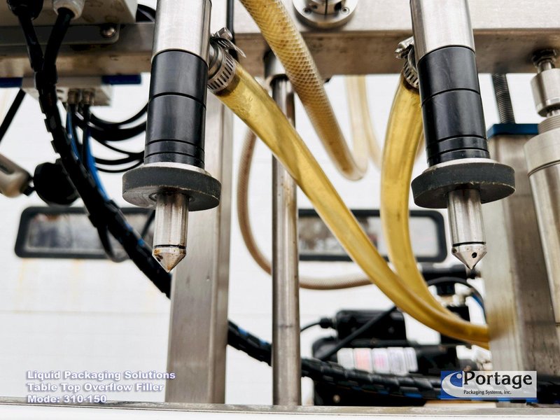 Liquid Packaging Solutions Model: 310-150  ||  Semi-Automatic Table Top Overflow Filler