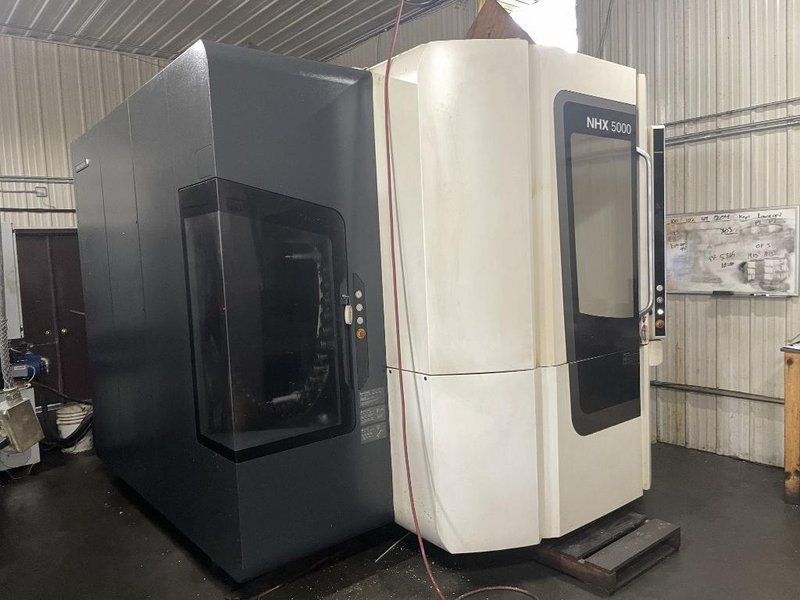 DMG Mori NHX5000 CNC Horizontal Machining Center with Pallet Changer, High Pressure Thru-Spindle Coolant, 60 Station Tool Changer, 50 HP High Torque 15,000 RPM Spindle
