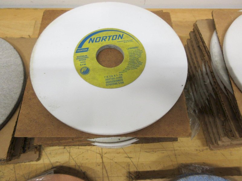 Norton Grinding Wheels 7" x 1-1/4", Assorted Widths and Types  (34pcs) **New Unused**- Auction Item