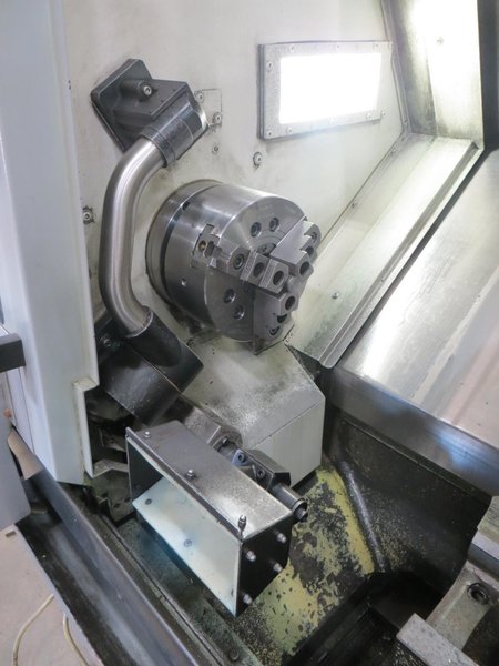 Okuma Genos L250E CNC Turning Center, OSP-P300L/R CNC Control, 8&quot; Chuck, Tool Setter, Parts Catcher, 12-Station Turret, Tailstock, Chip Conveyor