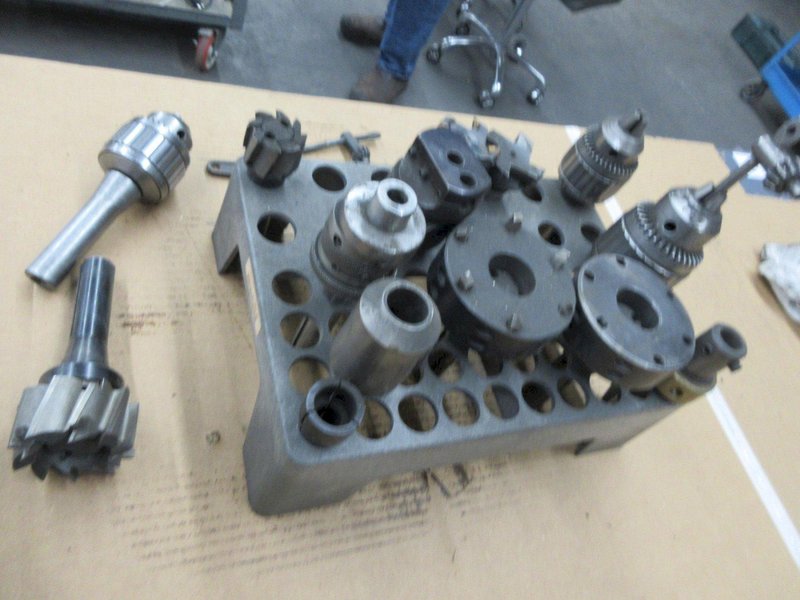 R8 Tooling in Rack, Assorted Size Jacobs Drill Chucks, Boring Heads, Shell Mills- Auction Item